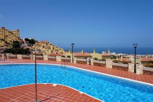 The swimming pool at or close to Panoramic View Balcón del Atlántico