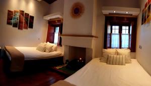 Postel nebo postele na pokoji v ubytování Astraka Guesthouse I