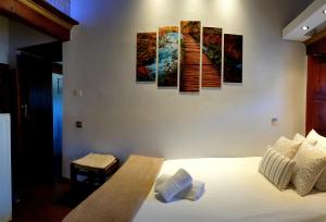 Postel nebo postele na pokoji v ubytování Astraka Guesthouse I
