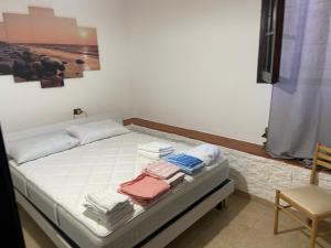Posteľ alebo postele v izbe v ubytovaní CALA SINZIAS, 150 mt dalla splendida spiaggia