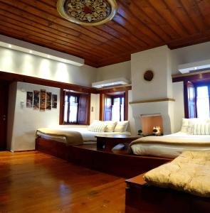 Postel nebo postele na pokoji v ubytování Astraka Guesthouse I