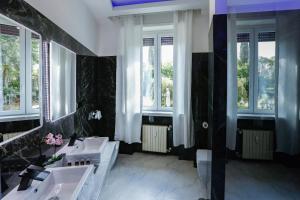 Voodi või voodid majutusasutuse Escape Luxury Suite - CA Domus Collection toas