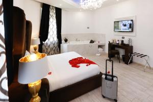 Voodi või voodid majutusasutuse Escape Luxury Suite - CA Domus Collection toas