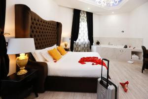 Voodi või voodid majutusasutuse Escape Luxury Suite - CA Domus Collection toas