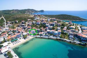 an aerial view of a resort and the ocean at Konstantinou Deluxe Apartments in Skala Marion