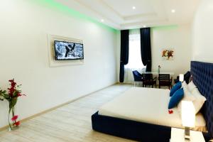 Voodi või voodid majutusasutuse Escape Luxury Suite - CA Domus Collection toas