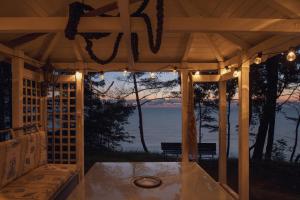 a screened in porch with a view of the water at Apartamenty Na Klifie Przystań No 18 in Władysławowo