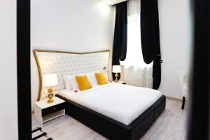 Voodi või voodid majutusasutuse Escape Luxury Suite - CA Domus Collection toas