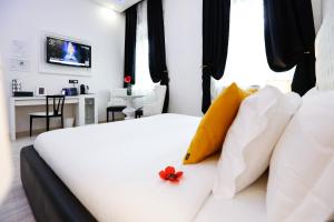 Voodi või voodid majutusasutuse Escape Luxury Suite - CA Domus Collection toas