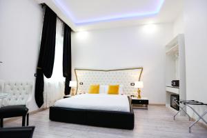 Voodi või voodid majutusasutuse Escape Luxury Suite - CA Domus Collection toas