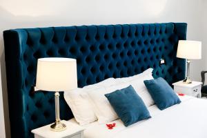 Voodi või voodid majutusasutuse Escape Luxury Suite - CA Domus Collection toas