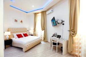 Voodi või voodid majutusasutuse Escape Luxury Suite - CA Domus Collection toas