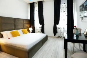 Voodi või voodid majutusasutuse Escape Luxury Suite - CA Domus Collection toas