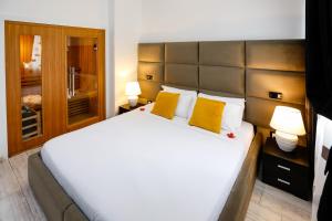 Voodi või voodid majutusasutuse Escape Luxury Suite - CA Domus Collection toas