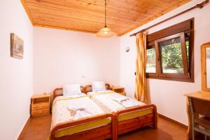 Postel nebo postele na pokoji v ubytování Archodissa Villa