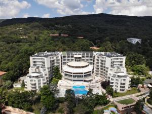 an aerial view of a large building with a pool at Golden Beach Park Hotel - All inclusive in Golden Sands