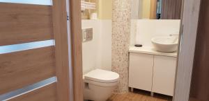 Kúpeľňa v ubytovaní Metropolis Apartamenty Centrum