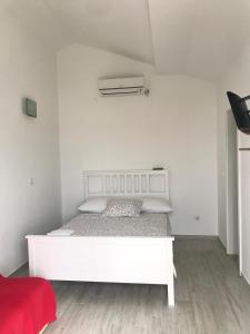 Postel nebo postele na pokoji v ubytování Guesthouse Davorka Bijelić