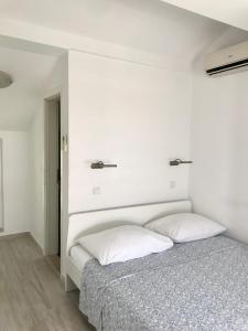 Postel nebo postele na pokoji v ubytování Guesthouse Davorka Bijelić