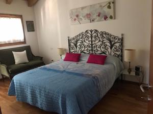 Posteľ alebo postele v izbe v ubytovaní Casa del Balcone Fiorito