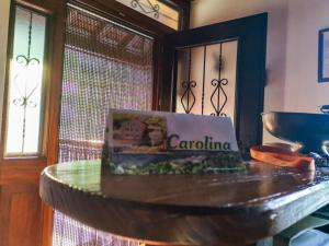 a wooden table with a cake on top of it at Casa Carolina in Vila Seca