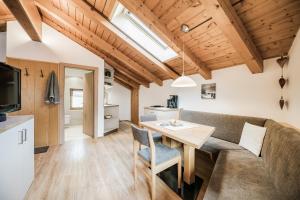 A kitchen or kitchenette at Appartements Sporting