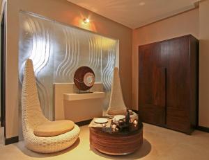 
a bathroom with a mirror and a bath tub at Two Seasons Boracay Resort in Boracay
