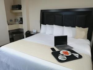 Letto o letti in una camera di Best Western Real Tula Express