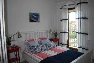 Ένα ή περισσότερα κρεβάτια σε δωμάτιο στο Apartament Morski