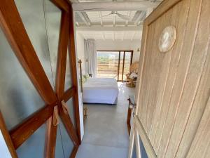 Een bed of bedden in een kamer bij Hortas do Rio - Casa de Campo