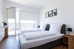 Posteľ alebo postele v izbe v ubytovaní ZatorHome apartamenty - blisko Energylandii i Zatorlandu