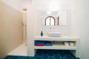 Ένα μπάνιο στο B&B Sa Cruxitta