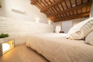 Postel nebo postele na pokoji v ubytování B&B Relais Druda