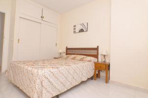 Ein Bett oder Betten in einem Zimmer der Unterkunft Torre Riviera