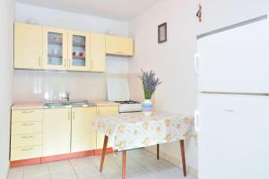 Kuchyňa alebo kuchynka v ubytovaní House Slavka