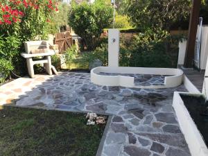 Vonkajšia záhrada v ubytovaní villetta san teodoro IUN Q7135