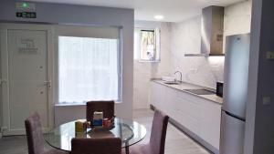 A kitchen or kitchenette at Apartamento los Acantilados Nº 2 Cobreces