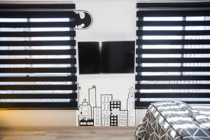 TV a/nebo společenská místnost v ubytování Studio Temático Bem Espaçoso - ALL1503