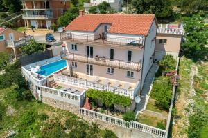 an aerial view of a house with a swimming pool at House Villa Andrea in Crikvenica