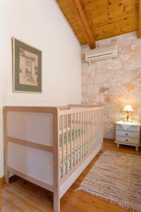 Postel nebo postele na pokoji v ubytování Armonia Houses