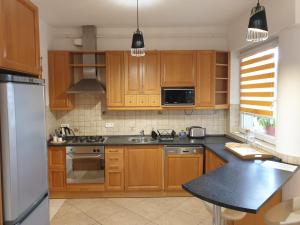 Kjøkken eller kjøkkenkrok på B6 Apartman