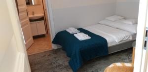 Posteľ alebo postele v izbe v ubytovaní Apartamenty i pokoje gościnne KOŁODZIEJÓWKA
