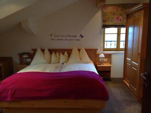 Letto o letti in una camera di Haus Hirschpoint