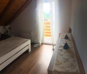 A bed or beds in a room at Holiday Home-kuća GORICA VERDE