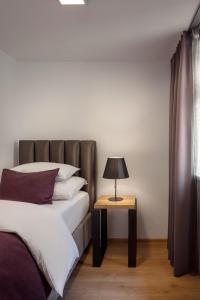 Letto o letti in una camera di MOODs Charles Bridge