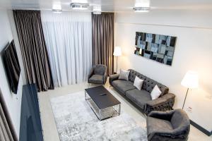 Khu vực ghế ngồi tại Enjoy Life Apartments