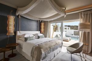 Cama ou camas em um quarto em Palladium Hotel