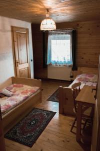 Postel nebo postele na pokoji v ubytování PENZIJON URBANC