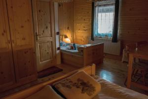 Postel nebo postele na pokoji v ubytování PENZIJON URBANC