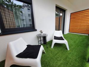 Vonkajšia záhrada v ubytovaní Apartament 56